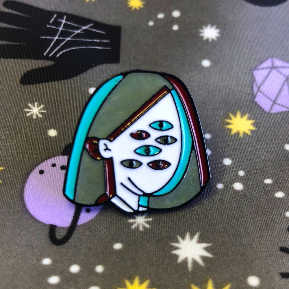 The Girl With Many Eyes Enamel Pin